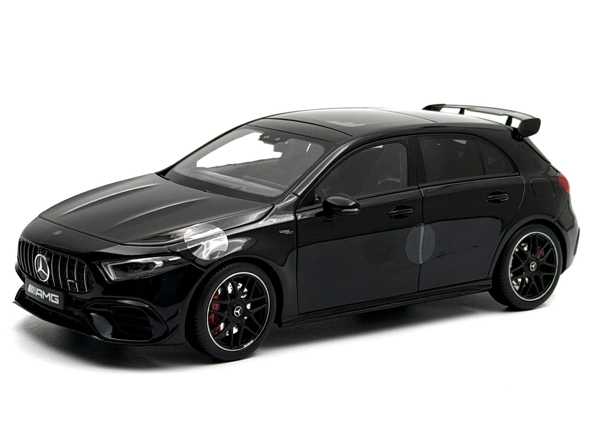 1:18 Mercedes-Benz A45S Cosmos Black 2023- NZG Dealer
