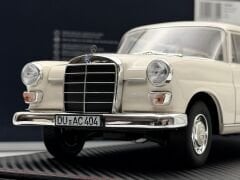 1:18 Mercedes-Benz 200 W110 Universal Cream 1966 - Norev