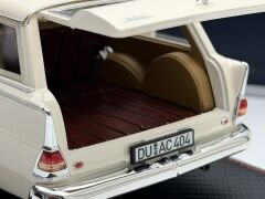 1:18 Mercedes-Benz 200 W110 Universal Cream 1966 - Norev
