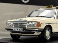 1:18 Mercedes-Benz 200 W123 Taxi Light Ivory 1980 - Norev